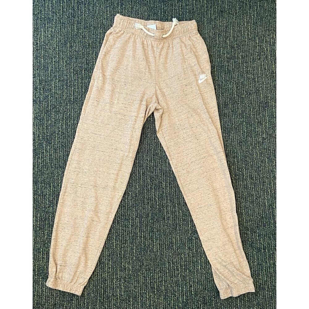 Nike Sportswear women’s Joggers pink multi colored Size XS white tag